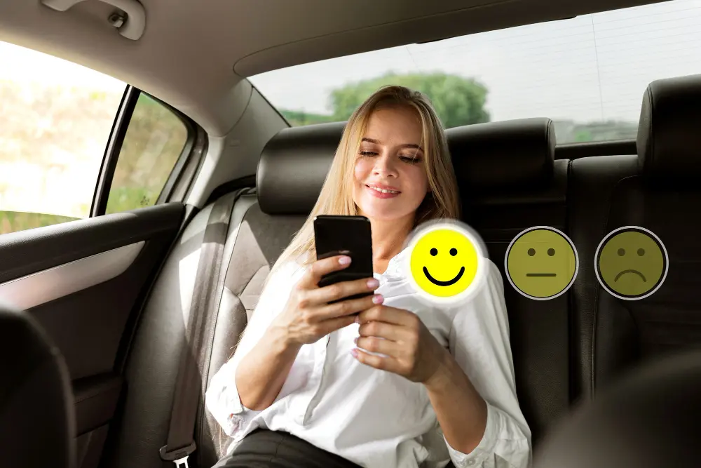 Girl is smiling while looking at a phone